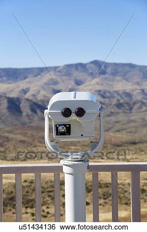 Stock Photograph - USA, Arizona, Coin operated binoculars in observation point. Fotosearch