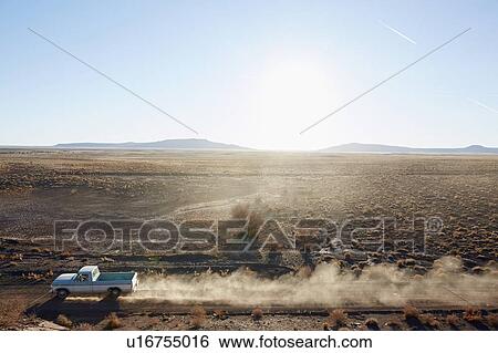 USA, Arizona, Pick-up truck on desert road View Large Photo Image Stock Photograph - USA, Arizona, Pick-up truck on desert road. Fotosearch