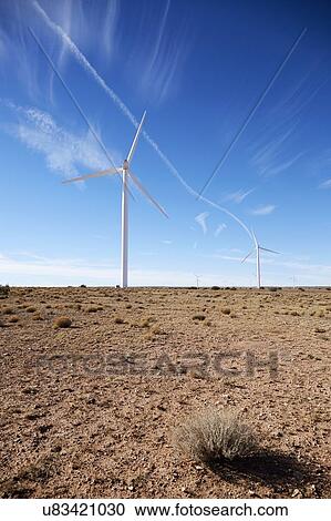 Stock Image - USA, Arizona, Wind turbines in arid landscape. Fotosearch