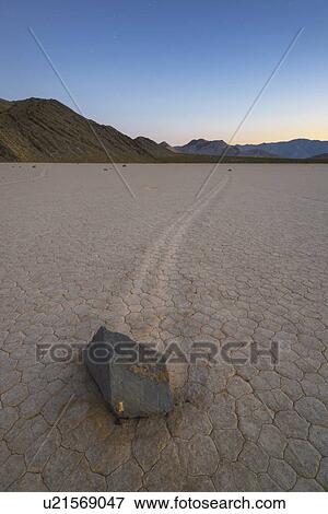 Stock Photo - USA, California, Death Valley National Park, Race track Playa, Stones moving on desert. Fotosearch