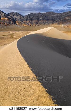 USA, California, Death Valley National Park, Eureka Dunes, Sand dune and mountains View Large Photo Image Stock Photo - USA, California, Death Valley National Park, Eureka Dunes, Sand dune and mountains. Fotosearch