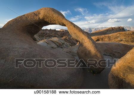Stock Photo - USA, California, Owens Valley, Mobius Arch, Natural arch and other rock formations. Fotosearch