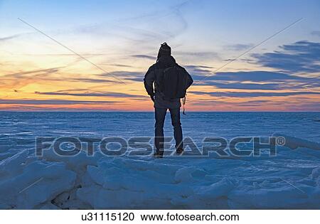 USA, Massachusetts, Eastham, Cape Cod, Rear view of mature man looking at sea at sunset View Large Photo Image Stock Image - USA, Massachusetts, Eastham, Cape Cod, Rear view of mature man looking at sea at sunset. Fotosearch