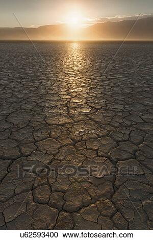 USA, Oregon, Alvord Desert, Cracked soil at sunset View Large Photo Image Stock Image - USA, Oregon, Alvord Desert, Cracked soil at sunset. Fotosearch