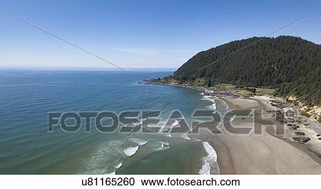 Stock Image - USA, Oregon, Headland, Elevated view of sea coast. Fotosearch
