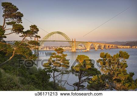 USA, Oregon, Newport, Bridge over river at sunset View Large Photo Image Stock Image - USA, Oregon, Newport, Bridge over river at sunset. Fotosearch