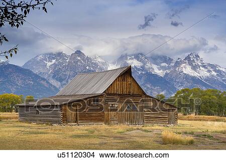 Picture - USA, Wyoming, Grand Teton National Park, Moulton Barn, Wooden barn in meadow. Fotosearch