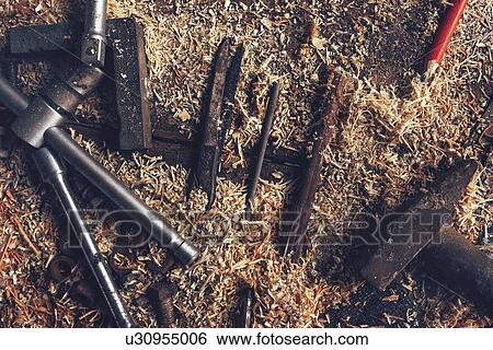 Stock Photograph - Various tools on old carpentry worktop.. Fotosearch