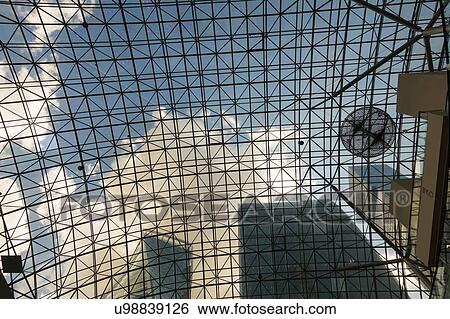 View through glass roof of skyscraper. Photographed in Moscow, Russia, in August 2015. View Large Photo Image Stock Photograph - View through glass roof of skyscraper. Photographed in Moscow, Russia, in August 2015.. Fotosearch