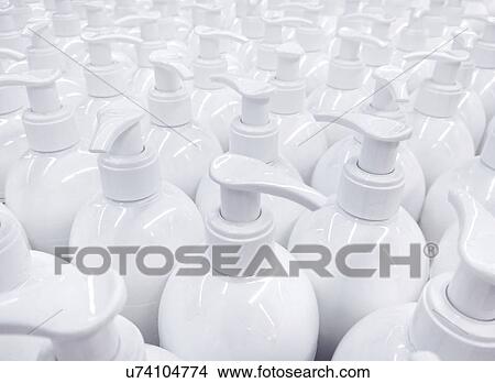 Picture - White liquid soap bottles.. Fotosearch