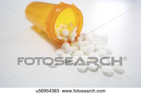 White pills spilling from bottle. View Large Photo Image Stock Image - White pills spilling from bottle.. Fotosearch