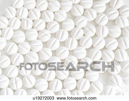 Stock Image - White pills.. Fotosearch