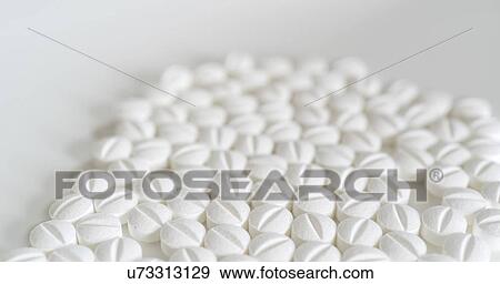 Stock Photo - White pills.. Fotosearch