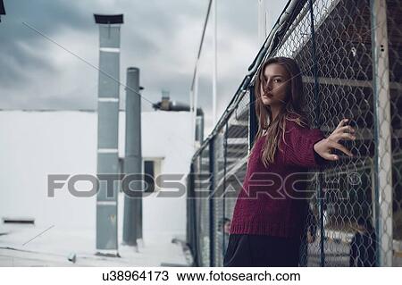 Woman beside fencing, Odessa, Odes'ka Oblast', Ukraine View Large Photo Image Stock Image - Woman beside fencing, Odessa, Odes'ka Oblast', Ukraine. Fotosearch