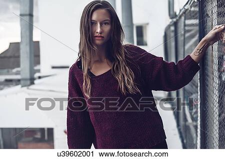 Woman beside fencing, Odessa, Odes'ka Oblast', Ukraine View Large Photo Image Stock Image - Woman beside fencing, Odessa, Odes'ka Oblast', Ukraine. Fotosearch