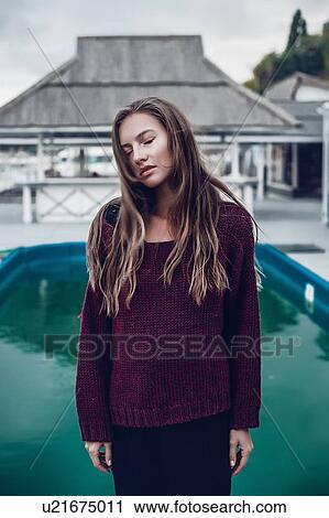 Stock Image - Woman by pool, Odessa, Odes'ka Oblast', Ukraine. Fotosearch