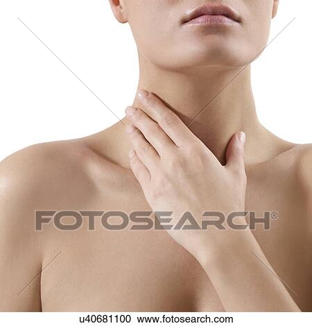 Stock Image - Woman checking her glands.. Fotosearch