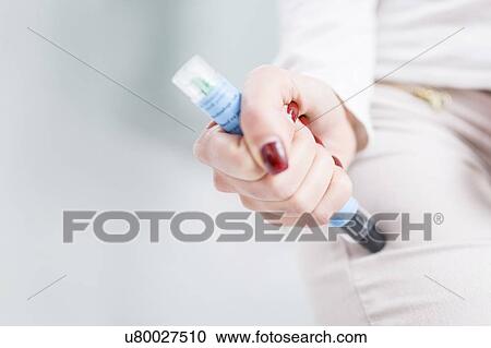 Woman injecting herself in the thigh. View Large Photo Image Stock Image - Woman injecting herself in the thigh.. Fotosearch