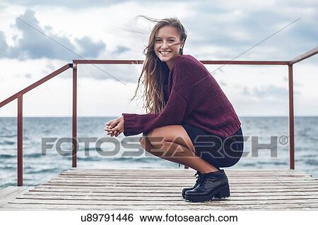 Woman on viewing platform at seaside, Odessa, Odes'ka Oblast', Ukraine View Large Photo Image Stock Photograph - Woman on viewing platform at seaside, Odessa, Odes'ka Oblast', Ukraine. Fotosearch