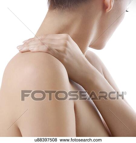Woman rubbing her shoulder. View Large Photo Image Stock Photo - Woman rubbing her shoulder.. Fotosearch