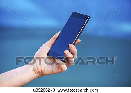 Woman using smartphone. View Large Photo Image Stock Image - Woman using smartphone.. Fotosearch