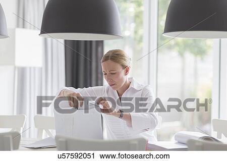 Woman working from home View Large Photo Image Stock Image - Woman working from home. Fotosearch
