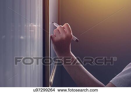 Woman writing on whiteboard. View Large Photo Image Picture - Woman writing on whiteboard.. Fotosearch