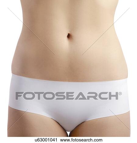 Stock Image - Woman's abdomen.. Fotosearch