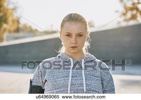 Young woman training, backlit portrait View Large Photo Image Stock Photography - Young woman training, backlit portrait. Fotosearch