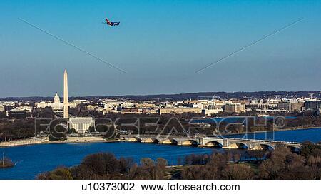 Aerial view of Washington D. C. from Top of Town restaurant, Arlington, Virginia shows Lincoln & Washington Memorial and U. S. Capitol and Memorial Bridge crossing Potomac River View Large Photo Image Stock Image - Aerial view of Washington D. C. from Top of Town restaurant, Arlington, Virginia shows Lincoln & Washington Memorial and U. S. Capitol and Memorial Bridge crossing Potomac River. Fotosearch