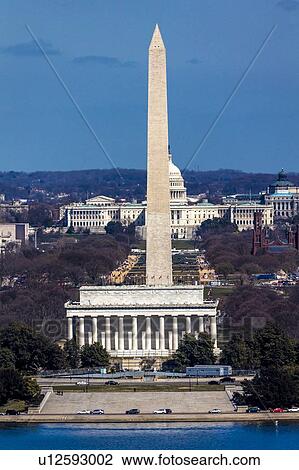 Stock Image - Aerial view of Washington D. C. from Top of Town restaurant, Arlington, Virginia shows Lincoln & Washington Memorial and U. S. Capitol. Fotosearch