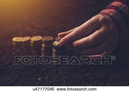 Stock Photograph - Agricultural costs, conceptual image.. Fotosearch