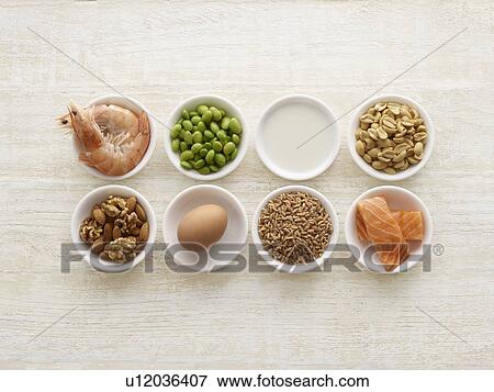 Stock Photo - Allergenic foods in bowls, still life.. Fotosearch