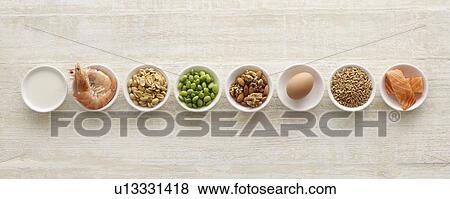 Stock Photo - Allergenic foods in bowls, still life.. Fotosearch
