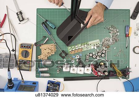 Assembling electronic device. View Large Photo Image Stock Photo - Assembling electronic device.. Fotosearch