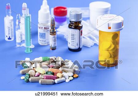 Stock Image - Assorted medicines and supplements.. Fotosearch
