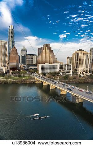 Picture - Austin Texas Cityscape Evening Skyline with skyscrapers down Congress Avenue Bridge over Colorado River. Fotosearch