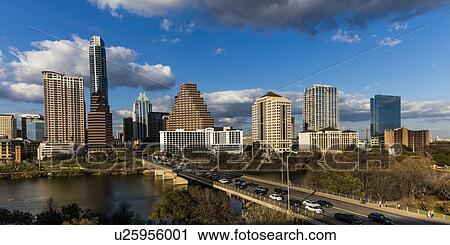 Stock Image - Austin Texas Cityscape Evening Skyline with skyscrapers down Congress Avenue Bridge over Colorado River. Fotosearch