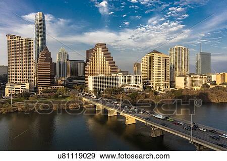 Stock Photo - Austin Texas Cityscape Evening Skyline with skyscrapers down Congress Avenue Bridge over Colorado River. Fotosearch