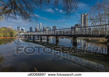 Stock Photo - Austin Texas skyline. The Boardwalk Trail at Lady Bird Lake. Fotosearch