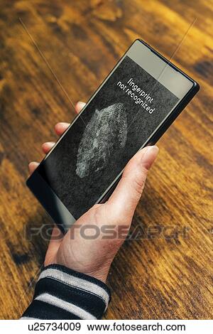 Stock Photo - Biometric security on smartphone.. Fotosearch