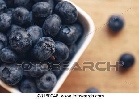 Stock Photograph - Blueberries in ceramic bowl.. Fotosearch