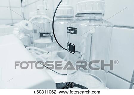 Stock Image - Bottles in laboratory.. Fotosearch