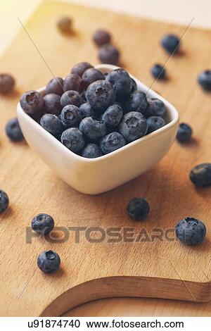 Stock Image - Bowl of blueberries.. Fotosearch