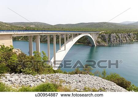 Stock Photo - bridge over the sea strait in Croatia. Fotosearch