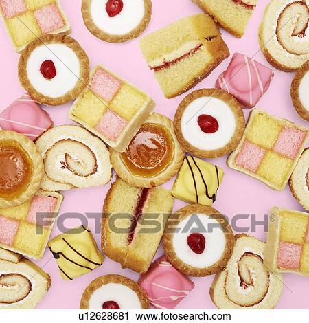Stock Image - Cakes and biscuits.. Fotosearch