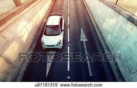 Car entering underpass. View Large Photo Image Stock Photo - Car entering underpass.. Fotosearch