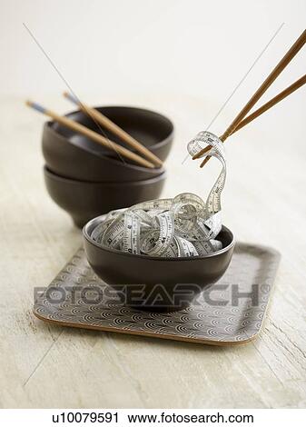 Chinese food bowl with tape measure. View Large Photo Image Stock Image - Chinese food bowl with tape measure.. Fotosearch