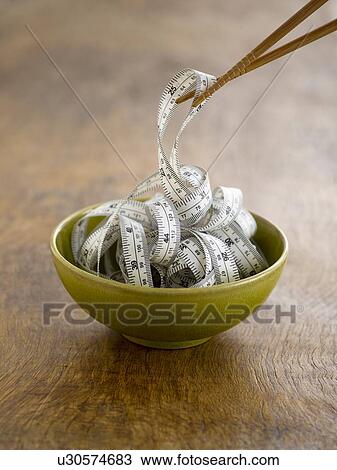 Chinese food bowl with tape measure. View Large Photo Image Stock Image - Chinese food bowl with tape measure.. Fotosearch