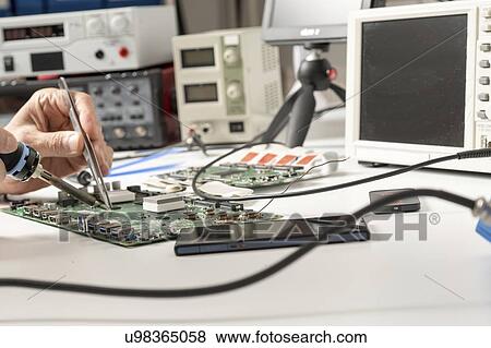 Circuit board repair. View Large Photo Image Stock Photo - Circuit board repair.. Fotosearch
